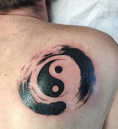 Ange qui pik, Tatoueur à Munchhausen