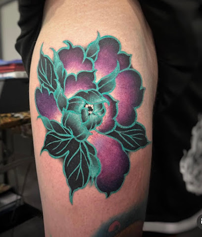 Blue Wolf Tattoo Piercing Tatoueur à Bons-en-Chablais