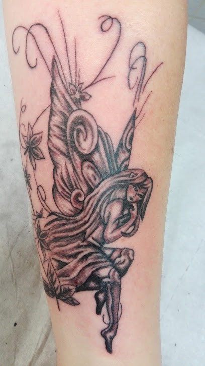 Ric's tattoo, Tatoueur à Moulins