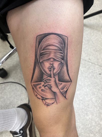 Dino's Ink / Natur'elles Elsa, Tatoueur à Gueugnon