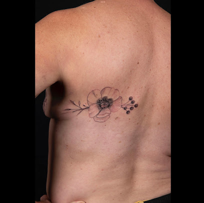 Barbapink Tattoo, Tatoueur à Aubrives