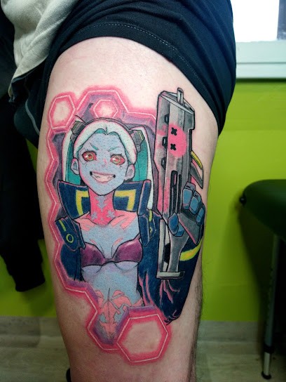 Inktopus, Tatoueur à Ousse