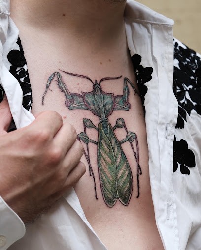 Maison Python - Tatouage Paris, Tatoueur à Paris 19