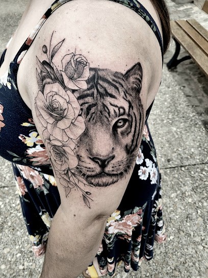 Tweedle Ink., Tatoueur à Saint-Benoît